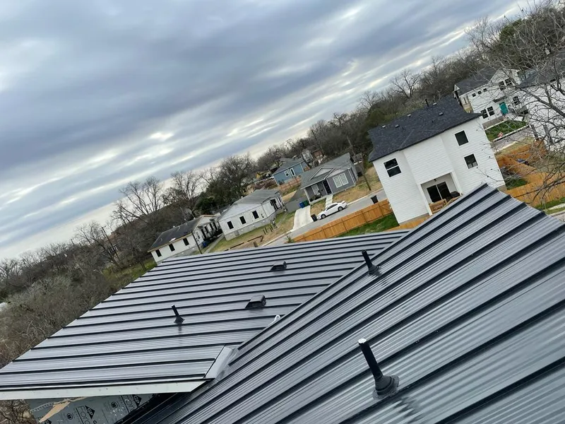 Standing seam metal roof panels with vents for Skylight Repair in Rochelle